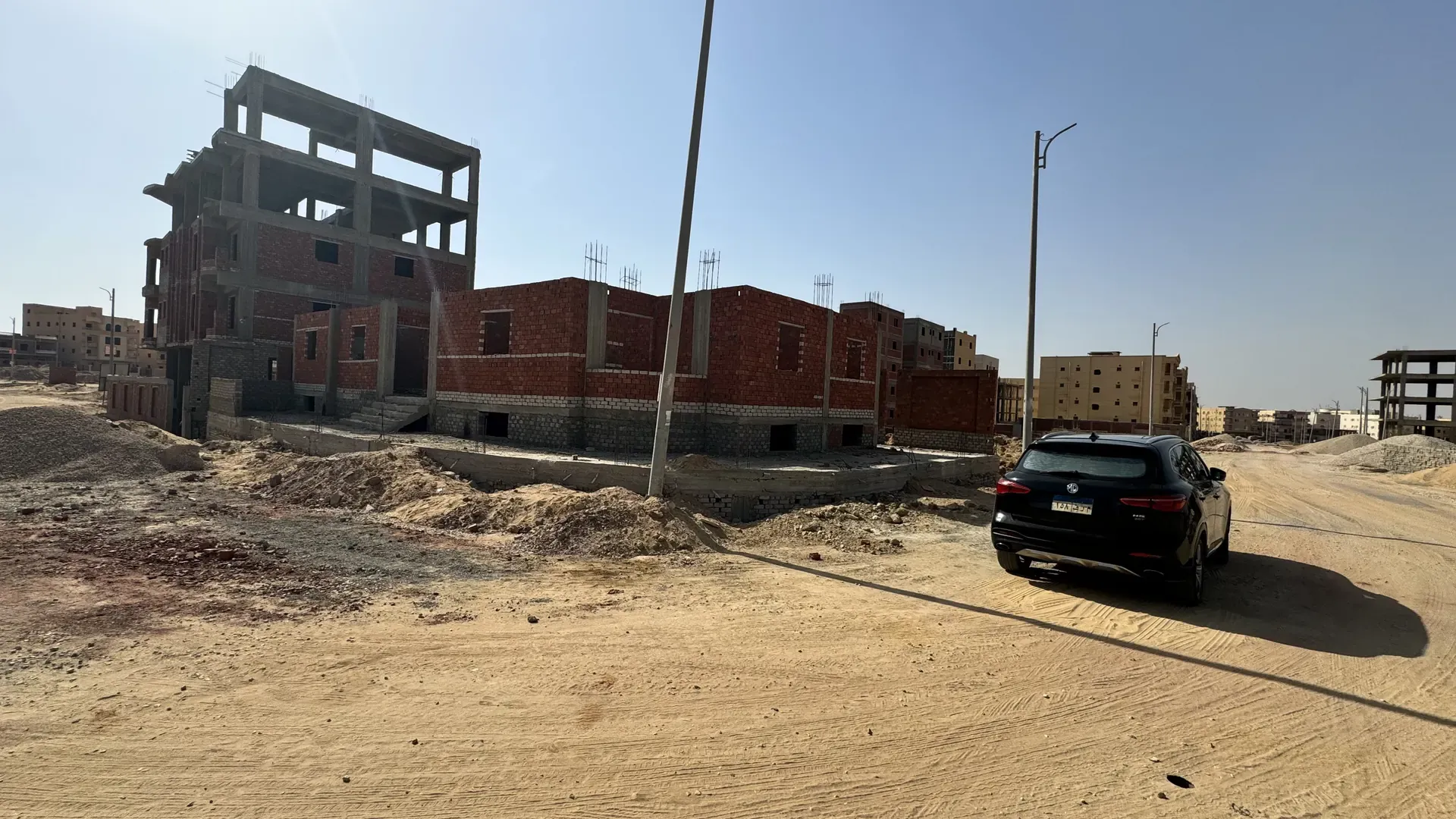 AFAQ residential building in Badr City at the stage: Concrete frame